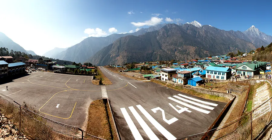 Panoramic view of Lukla Airport, village, and Kongde Peak in the background