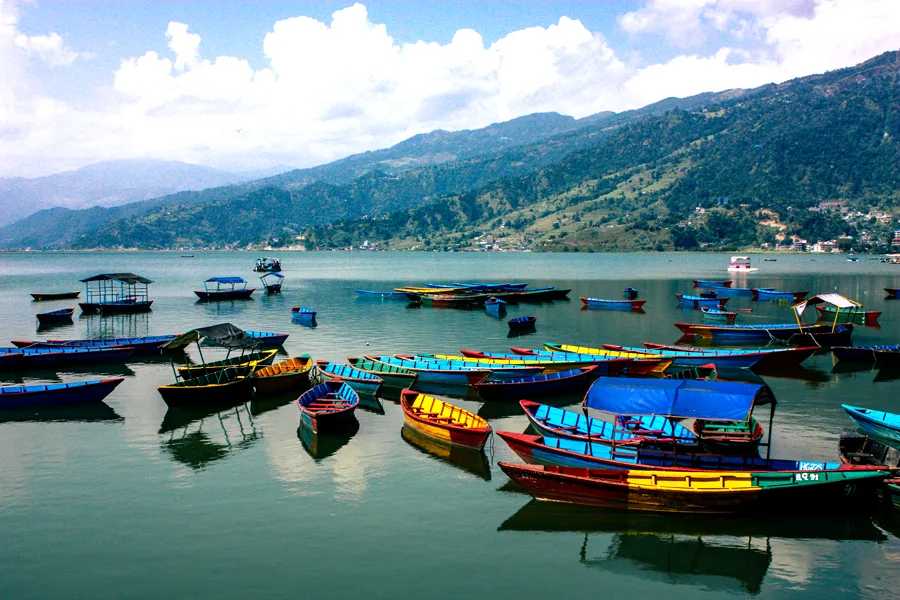 Colorful and traditional Nepalese boats at the Phewa lake 